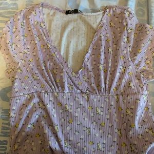 Purple crop top with white flowers Size XL